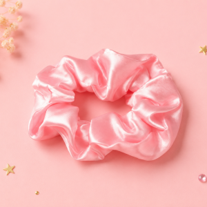Pink silk scrunchie included in the Queen Bee Box